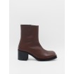 About Arianne Otis Caoba brown boot